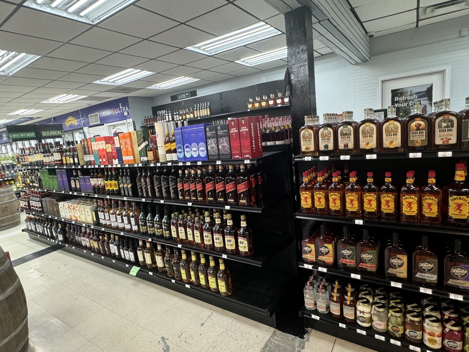 Bourbon shelf with fireball and whiskey